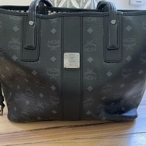 Absolutely gorgeous authentic MCM medium reversible tote with zip pouch.